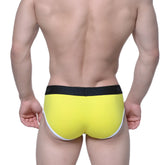 Bright yellow MetroMaleWear Astros brief with black waistband featuring brand name and white trim along leg openings