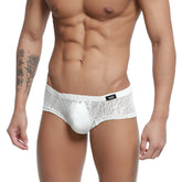 White lace men’s underwear trunk with solid ivory panel and black metro male wear brand tag