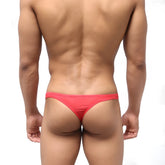 Red form-fitting thong made of stretchy fabric by MetroMaleWear shown from the back side