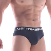 Black metromalewear brief thong with white logo waistband designed for comfort and style