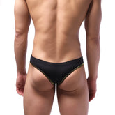 Black swim trunks by metromalewear caldero thong black 1202-20 with gold trim along the sides