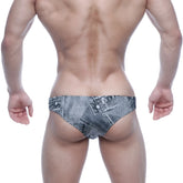 Denim-patterned swim trunks in faded blue-gray wash with stitched seams and button details metro malewear capri bikini