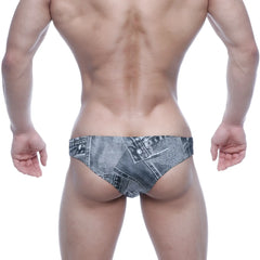 Denim-patterned swim trunks in faded blue-gray wash with stitched seams and button details metro malewear capri bikini
