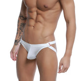 White form-fitting thong with distinctive side-tie design and subtle red branding on waistband by metromalewear