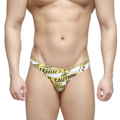 MetroMalewear caution bikini white 5103-m60 yellow and black caution tape patterned swim trunks front view