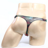 MetroMaleWear Cebada thong 2302-M88 sheer patterned black thong with vibrant red green and teal stripes