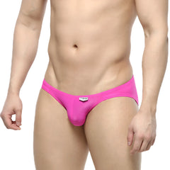 Bright pink form-fitting men’s briefs with sleek smooth fabric and a white brand tag at the waistband by MetroMaleWear