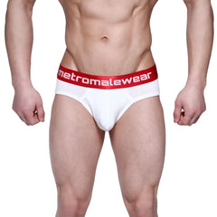 White men’s ribbed briefs with a red elastic waistband featuring metromalewear logo in white lettering
