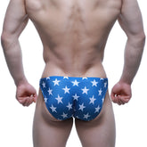 Blue swim trunks with white star pattern from metromalewear classic swim bikini patriot 4937-90