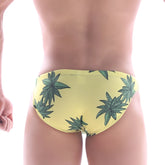 Yellow metro male wear classic swim bikini featuring green cannabis leaf pattern on swim trunks fabric