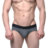 Gray cotton men’s briefs with black elastic waistband featuring meny logo from metromalewear hip brief green 3006-26