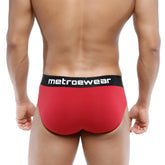 Red metrowear cotton hip briefs in terracotta with black waistband and white lettering for comfortable daily wear