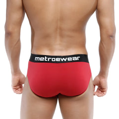 Red metrowear cotton hip briefs in terracotta with black waistband and white lettering for comfortable daily wear