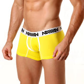 Bright yellow metro malewear cotton short boxer briefs with 7 inch inseam and white waistband with black lettering