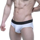 White men’s briefs with black elastic waistband featuring mevv logo metro male wear daily brief white 5003-01