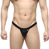 Black thong with a smooth form fitting design and a small red logo on the waistband by metromalewear