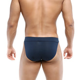 Navymalewear deseo bikini dark blue briefs with smooth form-fitting fabric and subtle elastic waistband shown from the back