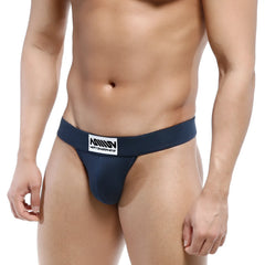 Dark blue metro malewear deseo thong with navy briefs and white label featuring million and metrogalwear text