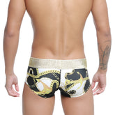 Black and white MetroMaleWear Egyptian Trunk 7013-99 swim trunks with gold anchor chain pattern and metallic waistband
