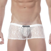 White lace men’s briefs with a black metro male wear brand label on the waistband in enhancement boxer lace nude 2043-71