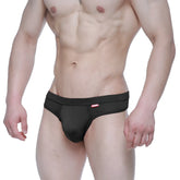 Black MetroMaleWear Eterna Thong 3722-20 with a red logo waistband designed for athletic comfort