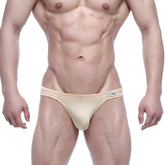 Beige form-fitting briefs with subtle sheen and small MetroMaleWear brand tag on the waistband from Eureka Bikini Gold 5223-21