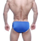 Bright blue metro malewear eureka bikini swim trunks with smooth slightly shiny fabric and a form-fitting design