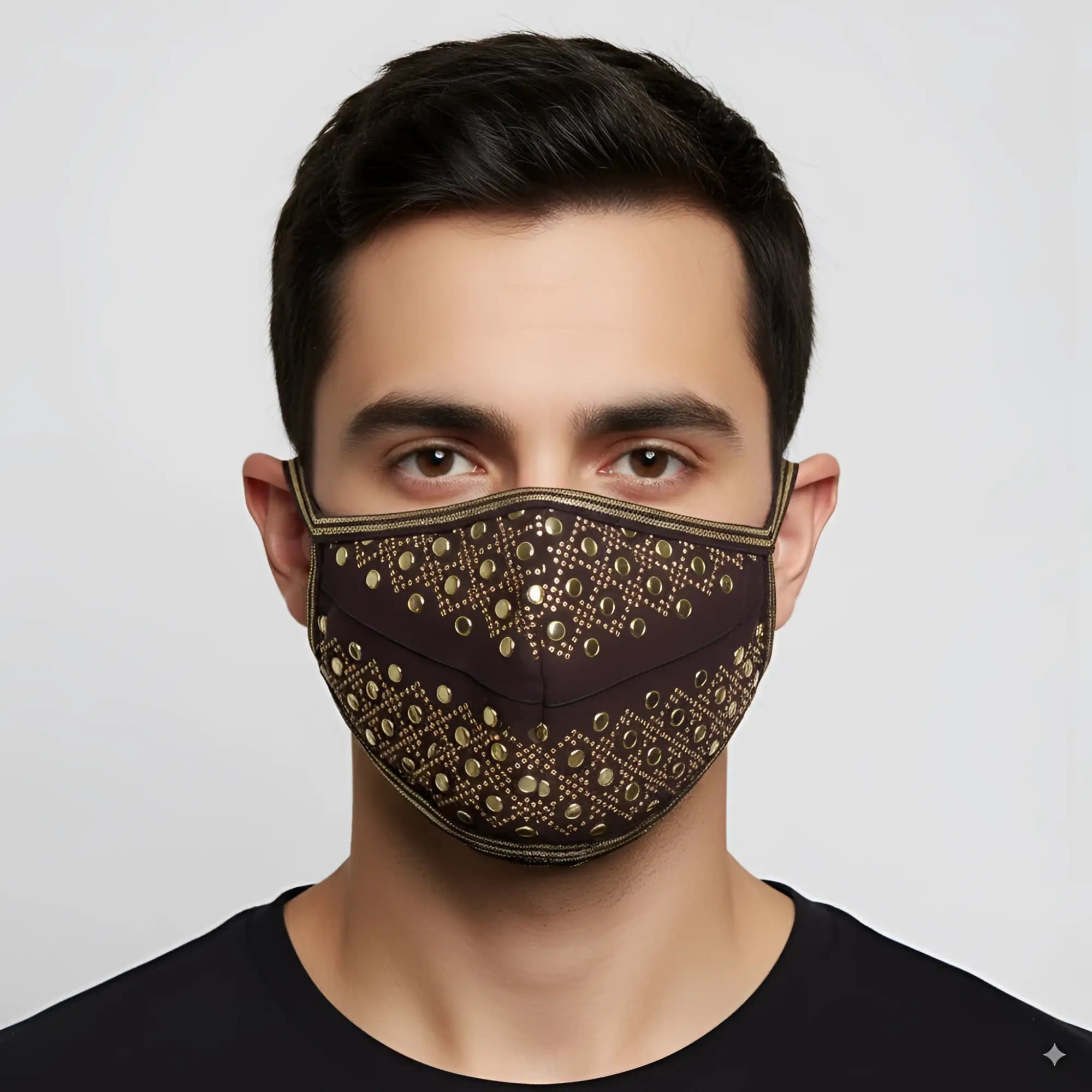 MetroMaleWear brown face mask with gold-tone metallic studs in geometric pattern and matching trim for stylish protection