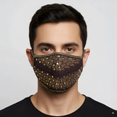 MetroMaleWear brown face mask with gold-tone metallic studs in geometric pattern and matching trim for stylish protection