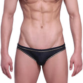 Black metroMalewear faro jock strap swim trunks with thin metallic gold trim on waistband and leg openings