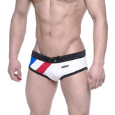 White swim trunks with bold blue red and black diagonal stripes and black waistband with army logo metroMalewear France flag