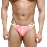 MetroMalewear freedom thong fuchsia 6012-01 featuring pink and lime green fabric with a small red brand tag on the waistband
