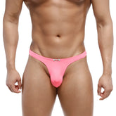 Pink mens thong with small rectangular brand tag on waistband metroMewear fria thong fuchsia 2322-02 front view