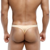 Beige MetroMaleWear Fria Thong gold 2322-21 made of smooth stretchy fabric with thin waistband and minimal coverage