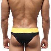 Black and yellow metroMaleWear halfback swim bikini with wide elastic waistband for comfortable fit