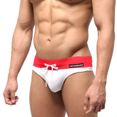 White swim trunks with bold red waistband and white drawstring featuring metromalewear label in metroMalewear halfback swim bikini white 4915-00