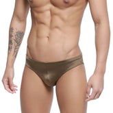 Shiny metallic gold metro malewear hunter swim brief with a sleek form-fitting design for men