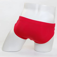 Bright red MetroMaleWear Ibiza swim brief 4928-12 displayed on a mannequin, ideal for men’s swimwear