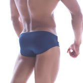 Navy blue MetroMaleWear Ibiza swim brief with gold metallic side seam accent designed for men