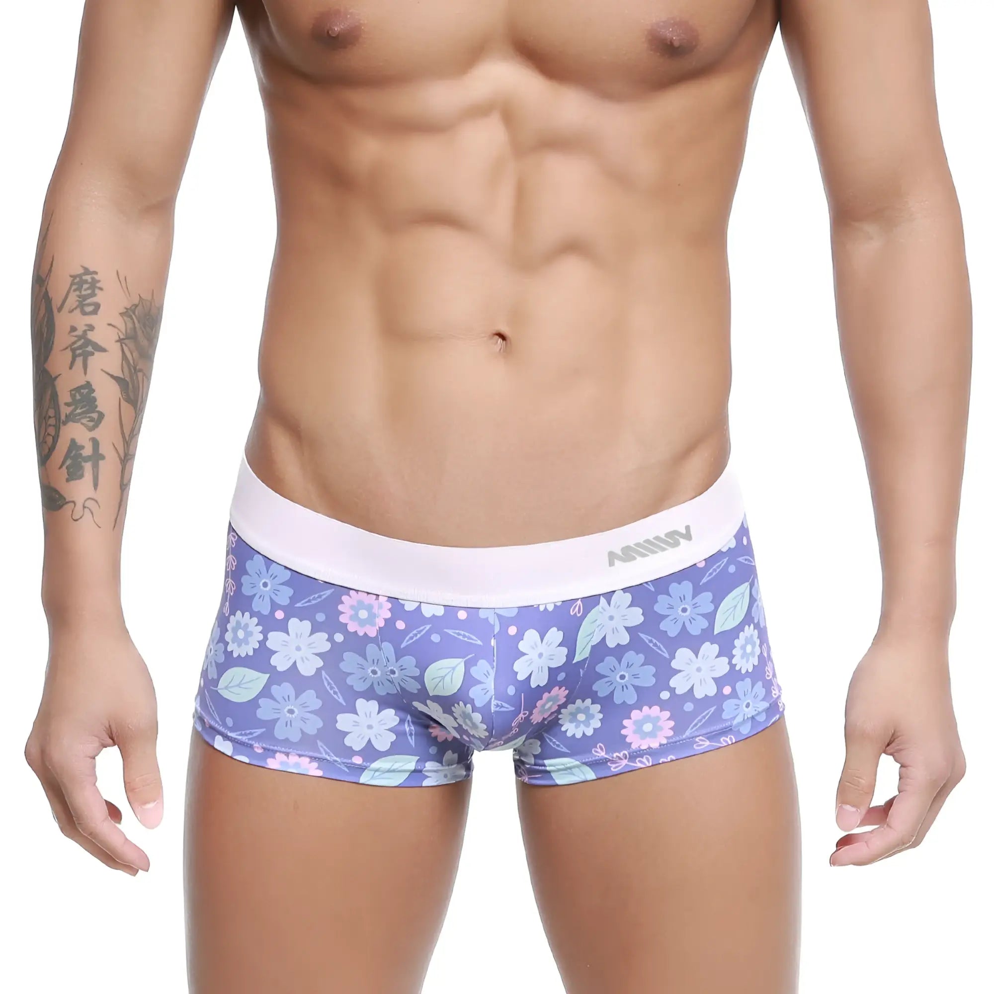 MetroMaleWear Jardin trunk 2026-15 purple floral patterned men’s briefs with white amin elastic waistband in gray lettering