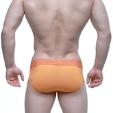 Orange athletic briefs metro malewear jugo brief 5203-14 with matching elastic waistband for active wear