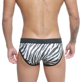 Black and white zebra-striped men’s briefs with solid black waistband from MetroMaleWear Kenya Swim Brief 4916-30