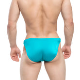 A vibrant turquoise metroMalewear lagoon swim bikini 4987-08 with form-fitting smooth fabric for swimming