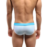 Light blue and white mesh swim trunks with a solid turquoise waistband from MetroMaleWear layered swim brief