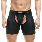 Black glossy faux leather briefs with central cutout and rectangular logo patch on waistband metroMalewear leather chaps 0011