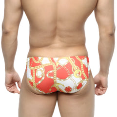 MetroMaleWear Lujo bikini red swim trunks with bold gold chain and anchor pattern in red and white colors