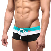 MetroMaleWear Lycos swim trunk green 4938-07 men’s swim trunks with bold teal white and black horizontal stripes and drawstring waistband