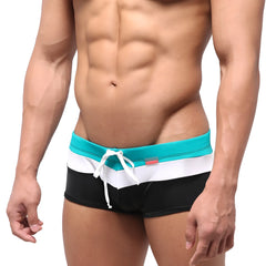 MetroMaleWear Lycos swim trunk green 4938-07 men’s swim trunks with bold teal white and black horizontal stripes and drawstring waistband