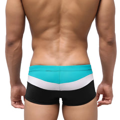 MetroMaleWear Lycos swim trunk green 4938-07 with turquoise white and black stripes and a sleek modern design