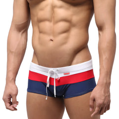 Metro male wear lycos swim trunk navy 4938-28 men’s navy blue swim trunks with bold red and white striped waistband